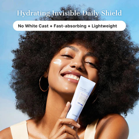 Woman holding a tube of 'Hydrating Invisible Daily Shield' with text highlighting features on a clear blue sky background.
