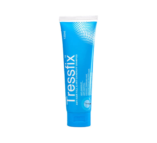 A 120ml squeeze tube of Tressfix Anti-Fade Anti-Mandruff Shampoo in a bright blue color with white text and a white cap, shown on a plain white background.