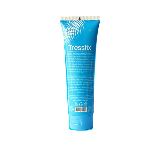 A blue squeeze tube of Tressfix hair treatment, shown from the back against a plain white background.