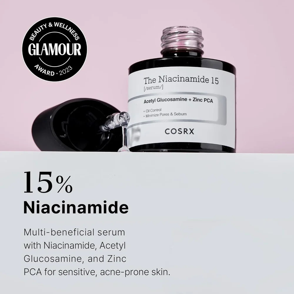 Cosrx Niacinamide 15 serum bottle with Glamour award badge on pink background