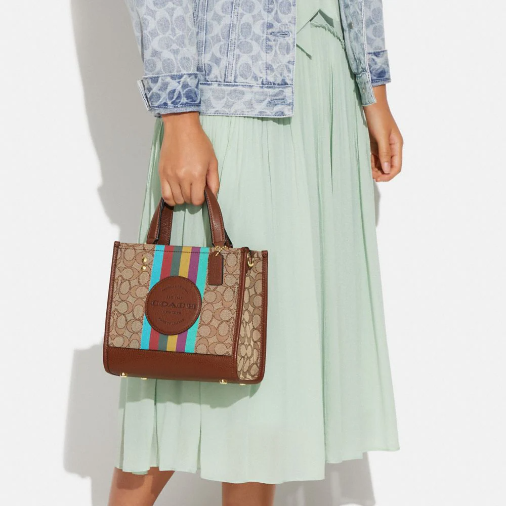 Buy Coach Dempsey Carryall In Signature Jacquard With Stripe And Coach Patch Bag Small in Pakistan