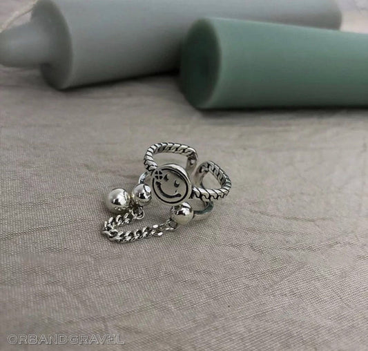 Buy Orb & Gravel Smiley Chain Silver Ring in Pakistan