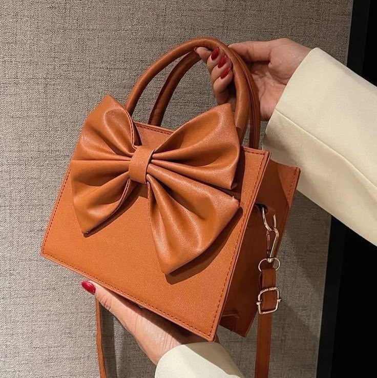 Buy HandBag Gloss Bow Brown in Pakistan