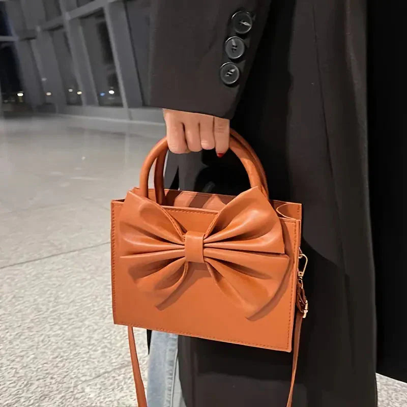 Buy HandBag Gloss Bow Brown in Pakistan
